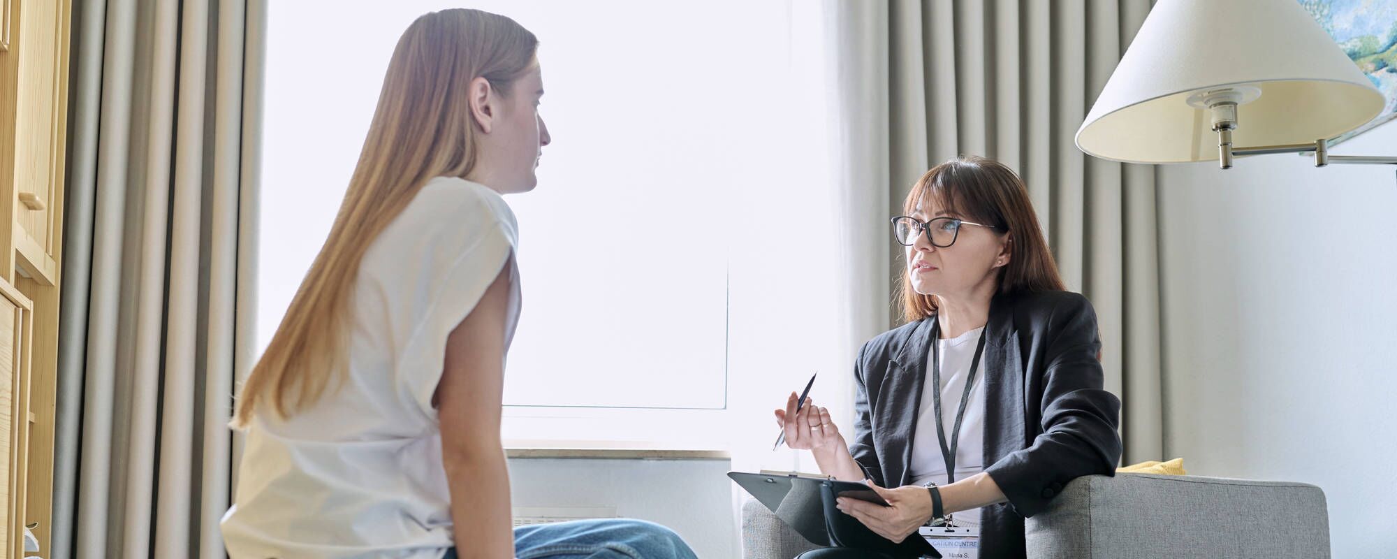 A teen girl in individual therapy for self-harm and suicidal ideation treatment at Pillars Health Group's adolescent treatment center in Concord, MA.