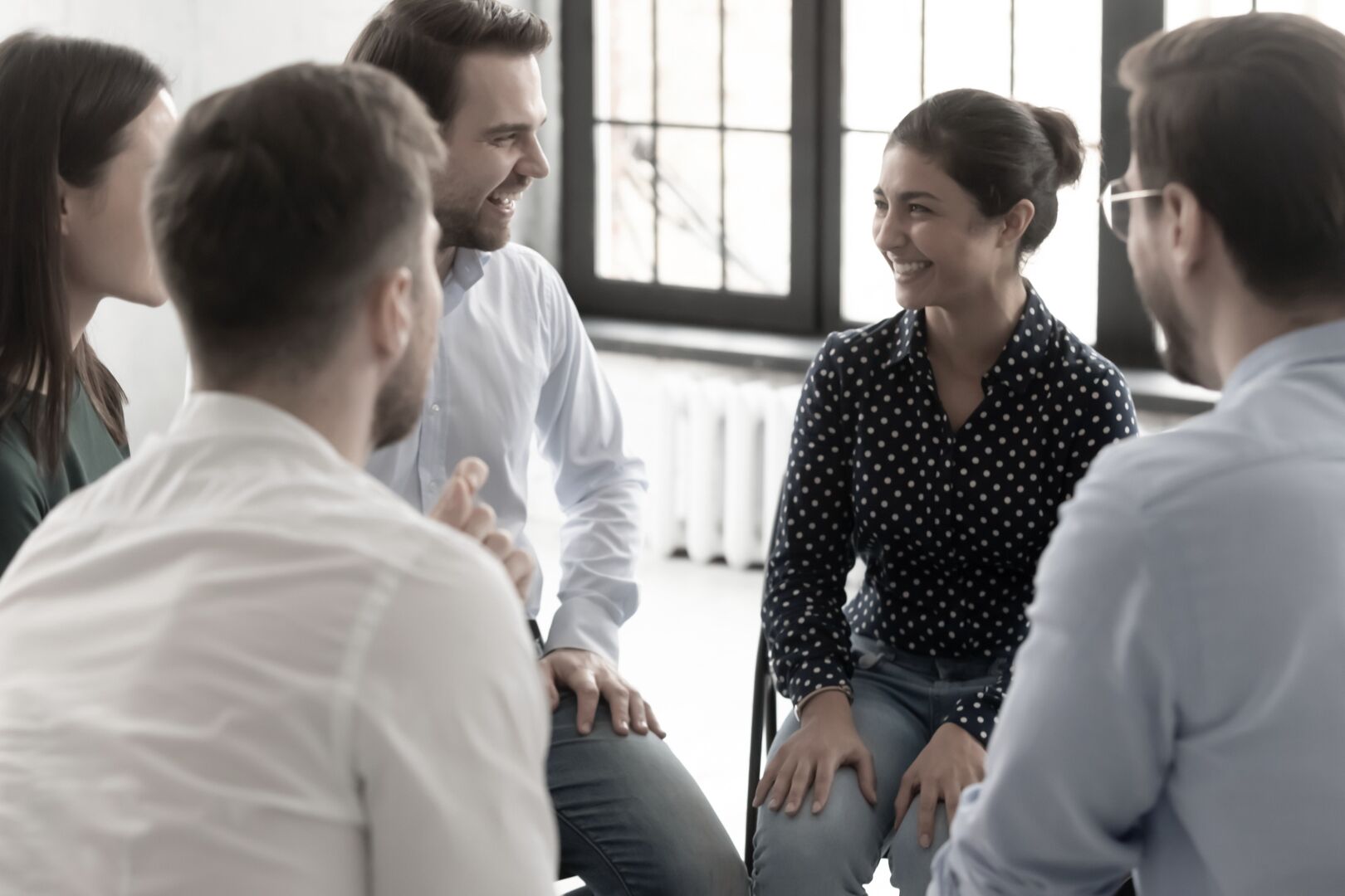 A group therapy session for outpatient cocaine addiction treatment in a Massachusetts or Maine rehab center.