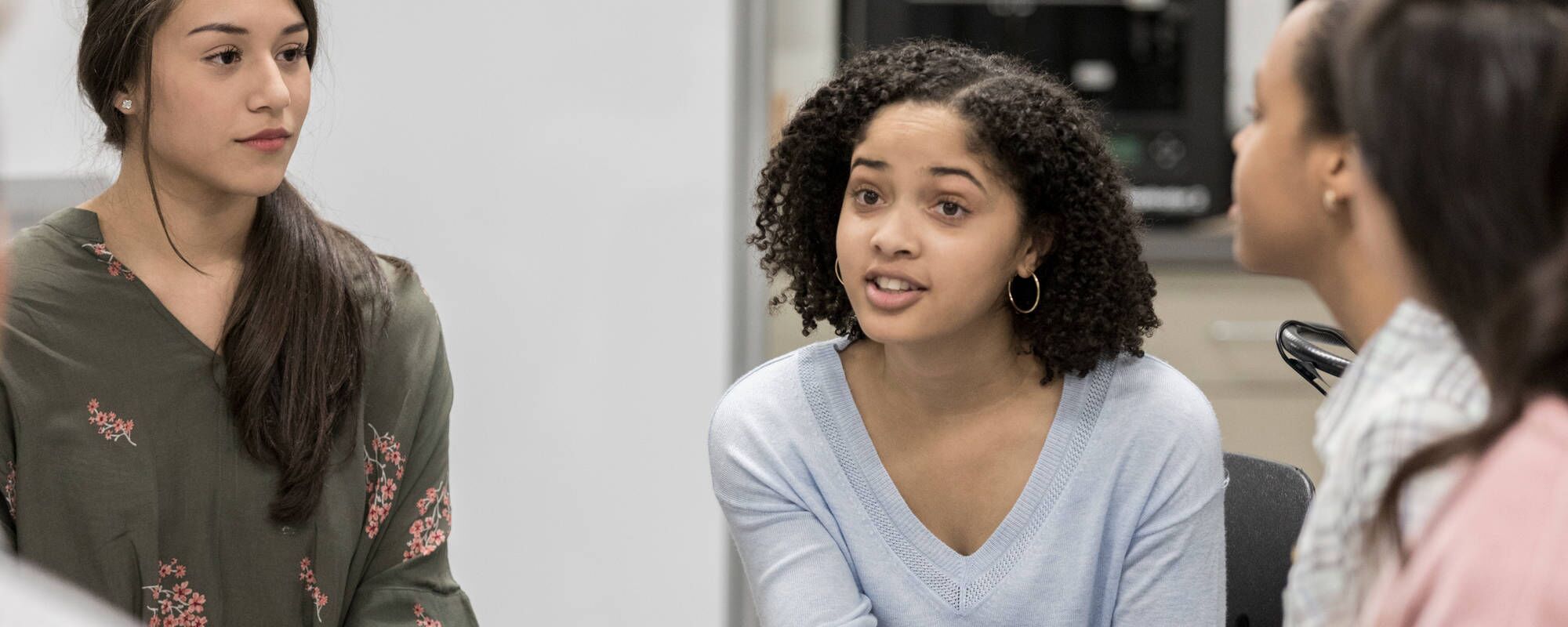 A group of teenagers in group therapy for teen ADHD treatment at Pillars Health Group's teen-focused treatment center in Concord, MA.