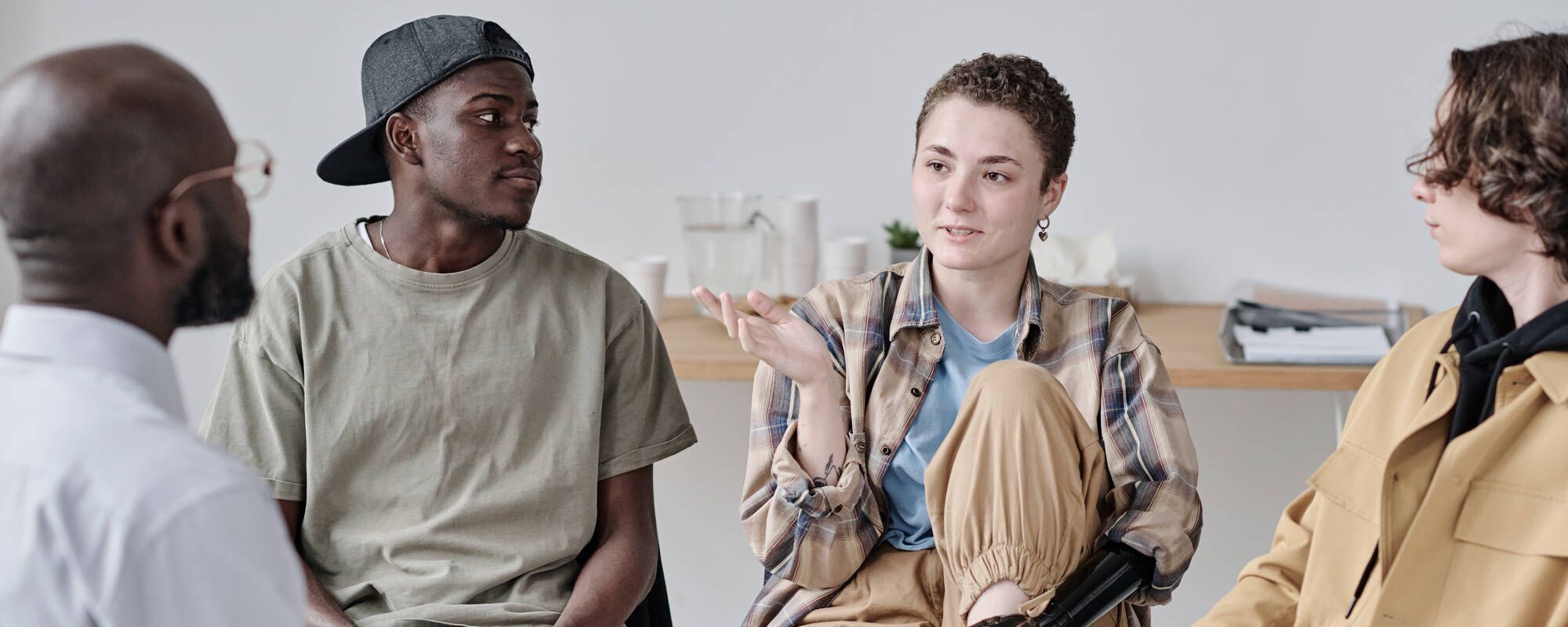 A group of teenagers in group therapy for teen PTSD treatment at Pillars Health Group's teen-focused treatment center in Concord, MA.