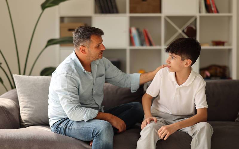 A father talking to his son about getting mental health treatment.