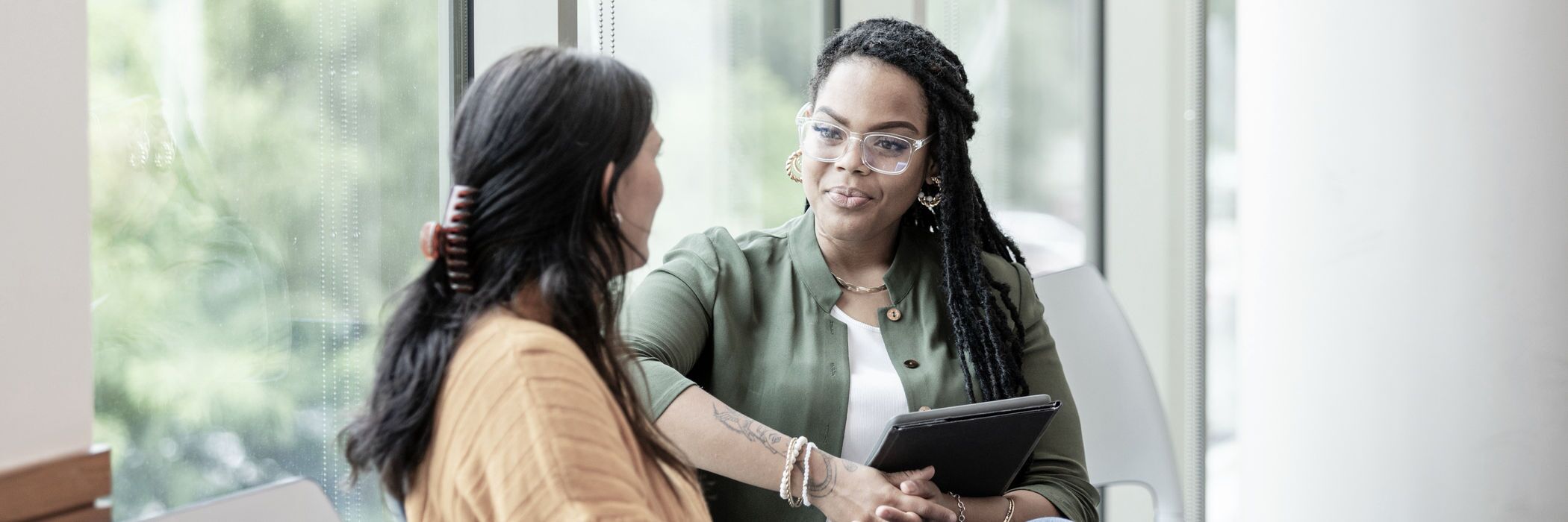 A woman in an individual therapy session for outpatient depression treatment at Pillars Health Group.