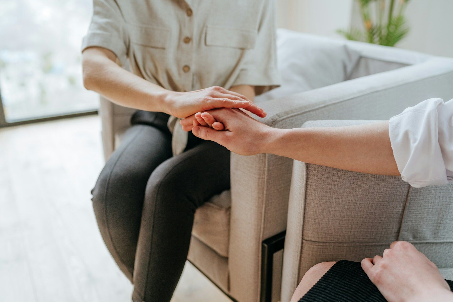 therapist comforting a patient